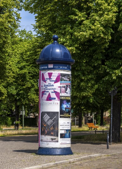 Advertising pillar designed in historical style. Potsdam, Brandenburg, Germany
