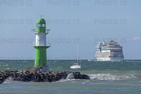 Cruise ship AIDA nova leaving, lighthouse, Warnow estuary, Baltic Sea, Warnemünde, Rostock, Mecklenburg-Western Pomerania, Germany