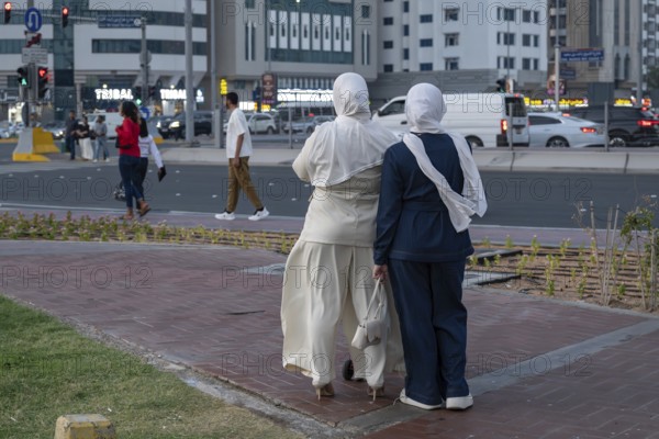 Women fashionably dressed with headscarf, Abu Dhabi, United Arab Emirates