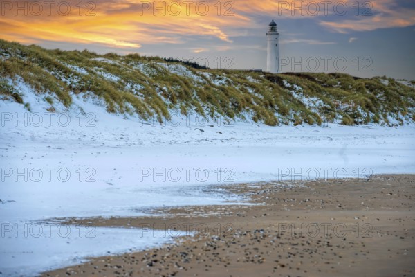 Lighthouse sunset in winter Fyred Hirthals Denmark