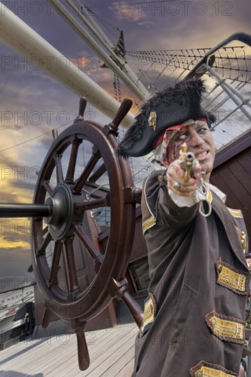 Pirate with a gun boards sailing ship