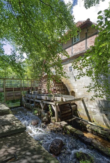 The Laderholz watermill, a technical monument, is located on the watercourse of the Alpe on the outskirts of Laderholz, a district of Neustadt am Rübenberge. The mill is driven by two water wheels. Laderholz, Neustadt am Rübenberge, Lower Saxony, Germany