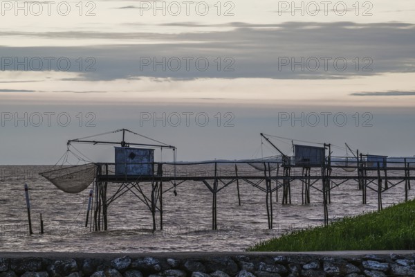Sunset over Fishing huts over Randonnee entre Histoire et Nature, Fouras, Fouras-les-Bains, Charente-Maritime, Nouvelle-Aquitaine, France