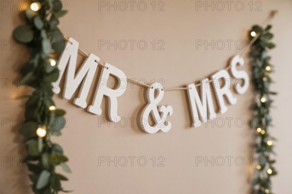 Close up of Mr & Mrs wedding garland. Romantic wedding decoration detail. Generative ai, AI generated