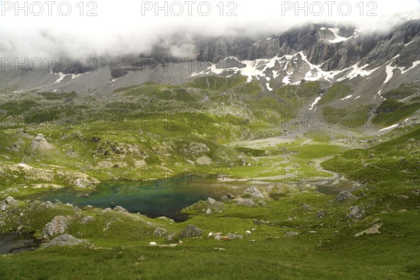 The Lacs des Aires lake in the Cirque de Troumouse basin in the Pyrenees National Park near Gavarnie-Gèdre, France