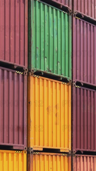 Busy international industrial port with freight and shipment docks and cargo containers