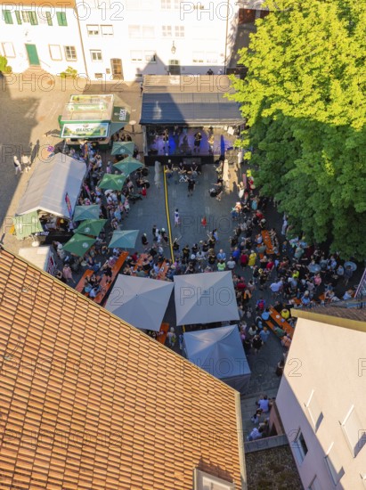 Aerial view of a large event with many people, tents and an outdoor stage, 950 years Weil der Stadt ceremony, Böblingen district, Germany