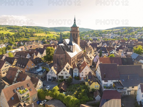 Aerial view of a village with a central church and surrounding half-timbered houses, 950th anniversary of Weil der Stadt, Böblingen district, Germany