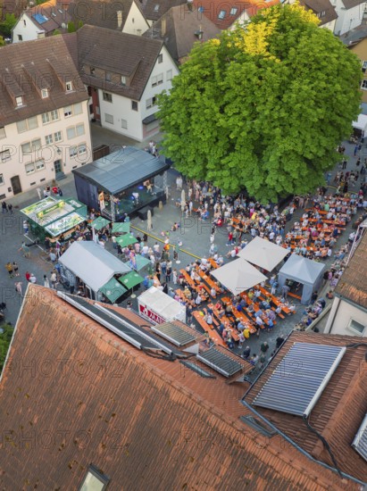 Viewed from above: well-attended festival site with tables and trees in the town centre, 950th anniversary of Weil der Stadt, Böblingen district, Germany