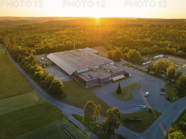 Factory at sunset, surrounded by woods and streets, Schnaufer sparkling wine cellars, Althengstett Calw