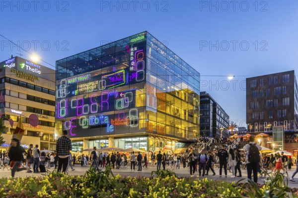 Stuttgart Art Museum in the evening with light installation and people on the steps. Long Night of the Museums in Stuttgart. Stuttgart, Baden-Württemberg, Germany