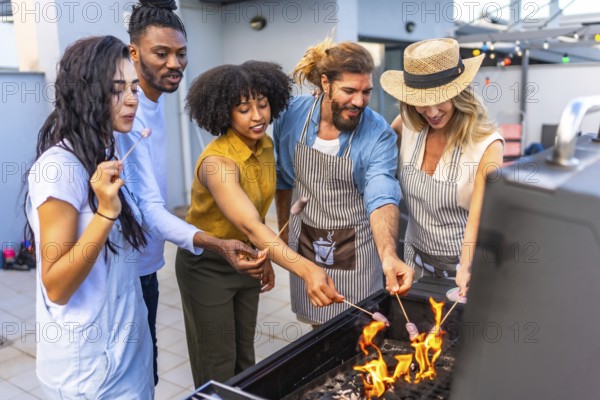 Cheerful friends grilling sausages on a rooftop, savoring the warmth of summer while enjoying a lively evening party together