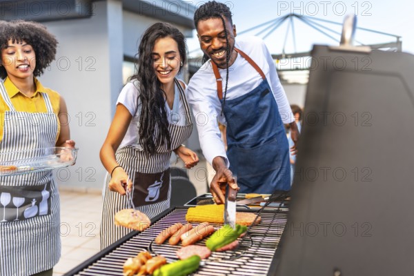 Happy friends enjoying a rooftop barbecue party, grilling delicious food, sipping drinks, and celebrating together under the evening sun