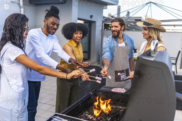 Happy friends enjoying a rooftop barbecue, roasting marshmallows over glowing flames while sharing laughter and creating lasting memories