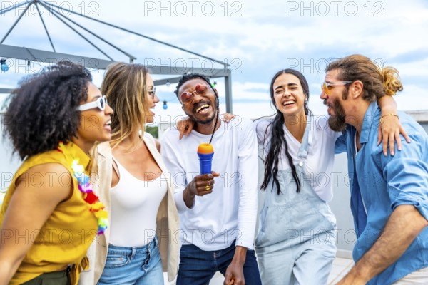 Five cheerful friends singing karaoke and enjoying a lively rooftop party, creating unforgettable memories under the vibrant summer sky