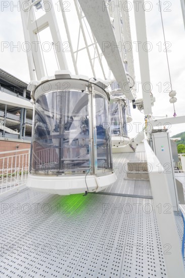 Close-up of a gondola of a Ferris wheel, shown in detailed surroundings, Ferris wheel construction, Calw, Germany