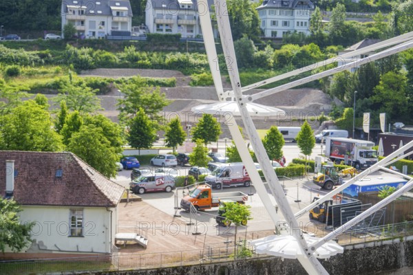 View of the town and parked vehicles from a Ferris wheel, Ferris wheel construction, Calw, Black Forest, Germany