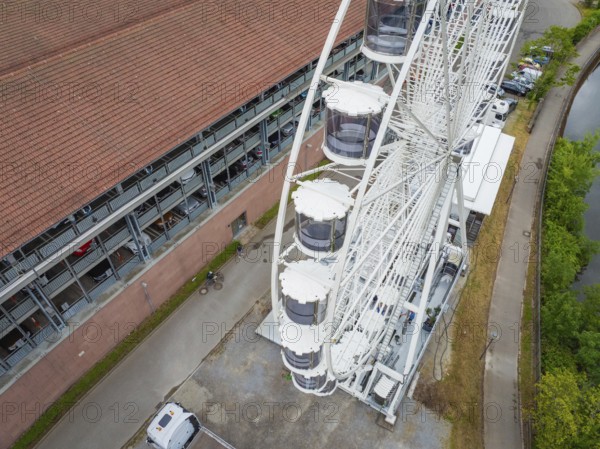 Detailed view of the Ferris wheel cabins next to a road and building, Ferris wheel construction, Calw, Black Forest, Germany