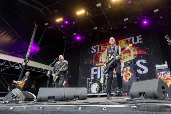 Jake Burns, singer, guitarist, Stiff Little Fingers, punk rock band, Northern Ireland, open air at the Citadel Music Festival, 04.07.2025, Zitadelle Spandau, Berlin, Germany < english> Stiff Little Fingers, punk rock band, Northern Ireland, open air at the Citadel Music Festival, July 4, 2025, Spandau Citadel, Berlin, Germany