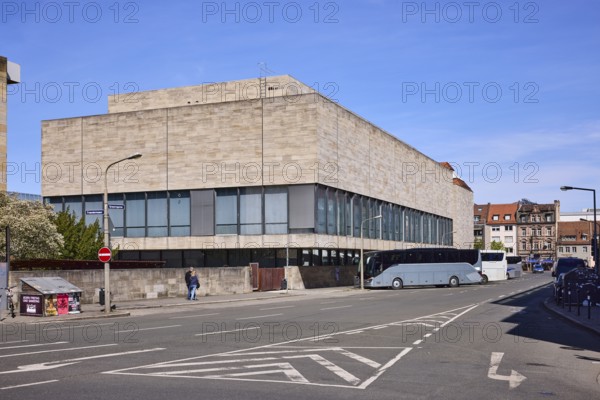 Germanisches National Museum, cultural history museum, modern architecture, building, parking boxes, coach, lantern, roadway, lane markings direction arrow, restricted area, blue sky, cirrostratus clouds, intersection Grasersgasse with Frauentor wall, Nuremberg, Middle Franconia, independent city, Bavaria, Germany