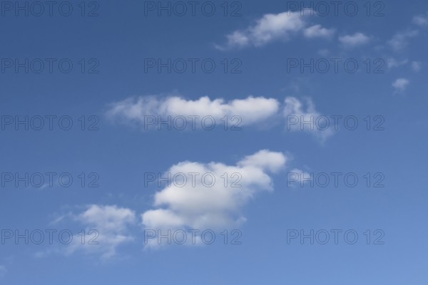 White clouds Altocumulus in front of blue sky. international