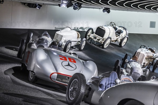 The Mercedes-Benz Museum in Stuttgart presents a journey through the automotive history of the global corporation. Myth 7: Racing cars and Silver Arrows - races and records. The history of the Mercedes star begins with the first automobile in 1886. Stuttgart, Baden-Württemberg, Germany