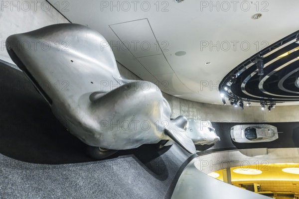Mercedes-Benz world record car T 80 from 1939, designed by Ferdinand Porsche with 3000 hp and a top speed of 600 kilometres per hour. However, it was never put into service for reasons of safety. The Mercedes-Benz Museum in Stuttgart presents a journey through the automotive history of the global corporation. Stuttgart, Baden-Württemberg, Germany