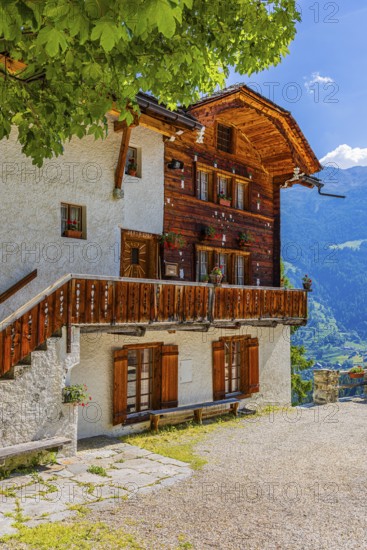 Parsonage, decorated with flowers, historic village centre, Grimentz, Val d'Anniviers, Valais Alps, Canton Valais, Switzerland