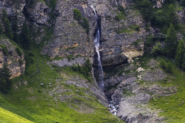 Waterfall cascading down a rock face, Zinal Valley, Val d'Anniviers, Valais Alps, Canton Valais, Switzerland