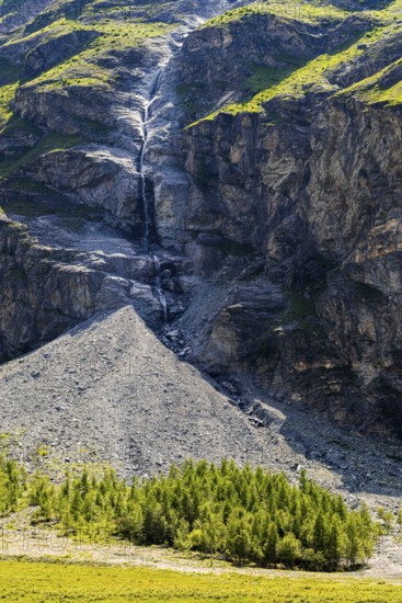 Waterfall cascading down a rock face, Zinal Valley, Val d'Anniviers, Valais Alps, Canton Valais, Switzerland