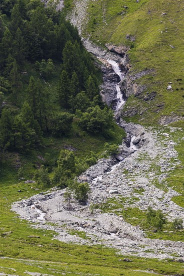 Waterfall cascading down the valley, Zinal Valley, Val d'Anniviers, Valais Alps, Canton Valais, Switzerland