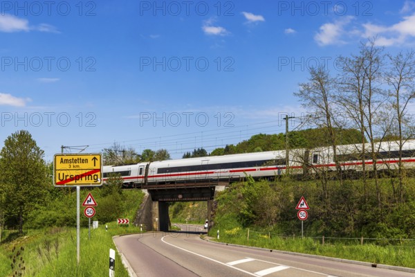 InterCityExpress ICE en route on the Swabian Alb near Lonsee. Landscape with railway bridge near Urspring on the Filstalline railway line in spring. Lonsee, Baden-Württemberg, Germany