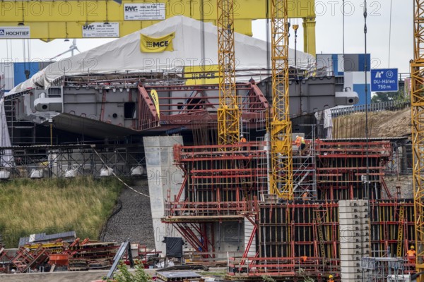 Rhine bridge Duisburg-Neuenkamp, motorway A40, start of construction of the second bridge, bridge piers and the first bridge segment are erected on the Neuenkamp side of the Rhine, North Rhine-Westphalia, Germany