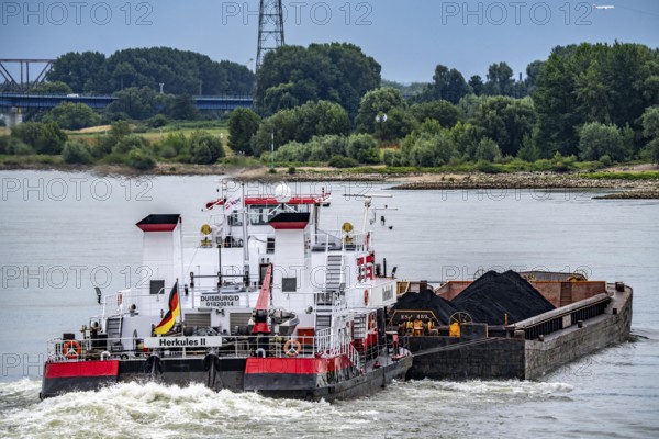Cargo ship on the Rhine, push boat Herkules II, pushed convoy, with coal for the HKM coking plant in Duisburg, North Rhine-Westphalia, Germany