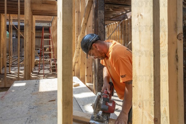 Detroit, Michigan - Jay Newcomb III helps rehab a long-vacant and crumbling commercial building in the Morningside neighborhood. The project, called Ultreia, will contain first floor commercial space and apartments above