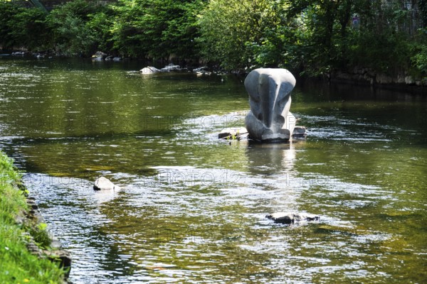 A suspension railway at the crash site of Tuffi the elephant. A sculpture of an elephant stands in the Wupper to commemorate the event, Wuppertal, Germany