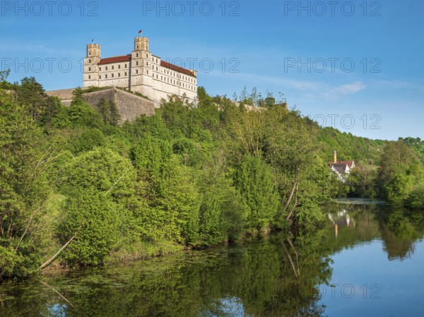 Willibaldsburg Castle is reflected in the River Altmühl, Altmühltal, Eichstätt, Upper Bavaria, Bavaria, Germany