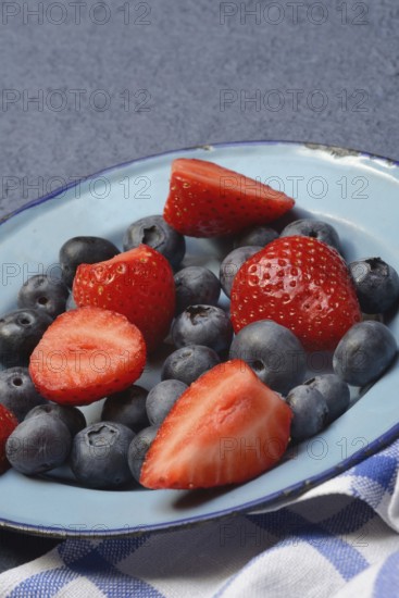 Plate with strawberries and blueberries, Fragaria, Vaccinium