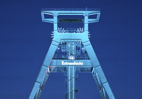 Illuminated headframe of the German Mining Museum at Extraschicht, Bochum, Ruhr area, North Rhine-Westphalia, Germany