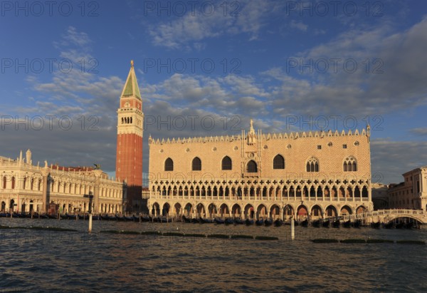 View from the Bacino di San Marco to the Doge's Palace and the Piazzetta in the evening, Venice, Veneto, Italy