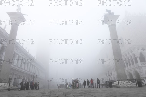 Theodorus and Lion Column in the Piazetta in the fog, Venice, Veneto, Italy