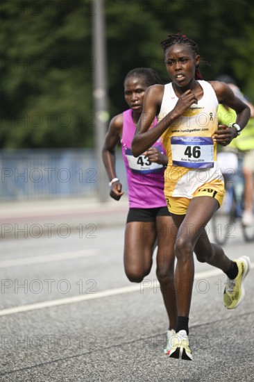 Rancy Kogo Kenya and Ann Nyaguthie Ndichu Kenya as the best-placed runners at the 31st Hella Half Marathon 2025, Hamburg, Germany