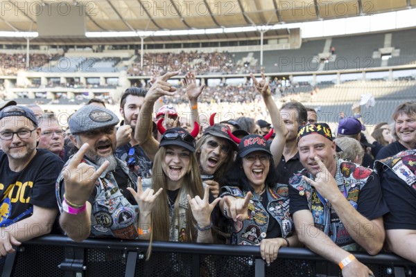 Fans in the front row in front of the concert of AC/DC live on Power Up Tour 2025 at the Olympiastadion Berlin on 30 June 2025