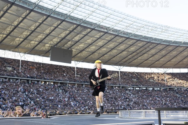 Angus Young, lead guitarist of AC/DC live on Power Up Tour 2025 at the Olympiastadion Berlin on 30 June 2025