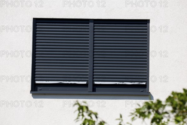 Electric aluminium roller shutter on a residential building