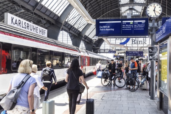 Platform at the main station with InterCity IC of the Swiss SBB. Karlsruhe, Baden-Württemberg, Germany
