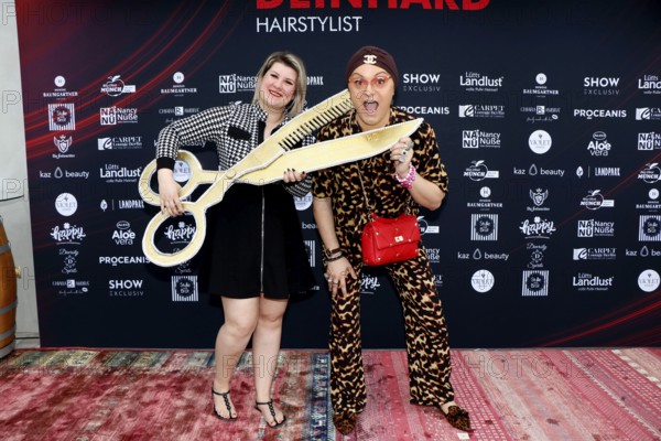 Janine Becker and Julian F. M. Stöckel at the VIP opening of the new Deinhard Salon Am Mühlanger 3, Berlin, 28 June 2025