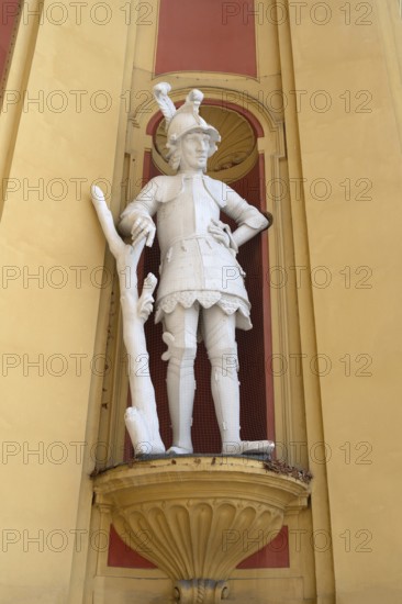 Sculpture of the giant Thyrsus, legendary figure, at the entrance portal of Wilten Abbey, Klostergasse 7, Wilten, Innsbruck, Austria