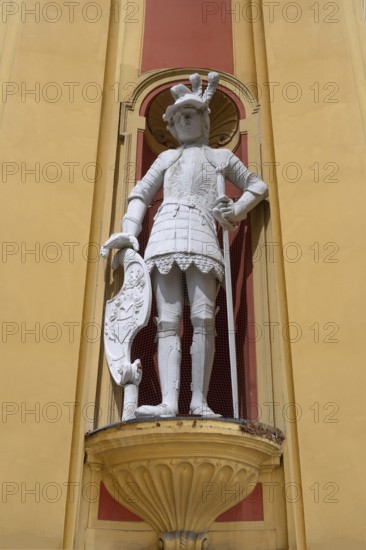 Sculpture of the giant Haymon, founder of the monastery, at the entrance portal of Wilten Abbey, Klostergasse 7, Wilten, Innsbruck, Austria