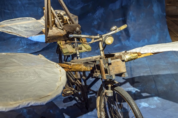 Gustav Mesmer, Icarus from Lautertal. The exhibition in the Zehntscheuer Münsingen shows the flying bicycles of a man who, after his release from a psychiatric hospital, began to fly high. One of his flying machines was presented at the EXPO 1992 world exhibition in Seville. Münsingen, Baden-Württemberg, Germany